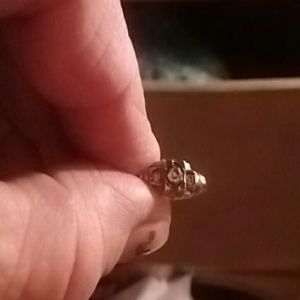 14 k Ring has three diamonds in it ..very nice 7 s